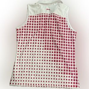 Excellent condition, size Medium, sleeveless Slazenger Women’s zip top